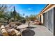 Spacious patio with seating area and desert landscaping at 35035 N Whileaway Rd, Carefree, AZ 85377