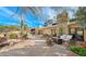 Relaxing patio with fire pit, seating area, and desert landscape at 35035 N Whileaway Rd, Carefree, AZ 85377