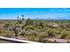 Expansive view of suburban neighborhood and mountain range at 35035 N Whileaway Rd, Carefree, AZ 85377