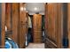 Large walk-in closet with built-in wooden shelving and drawers at 35035 N Whileaway Rd, Carefree, AZ 85377