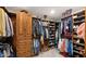 Spacious walk-in closet with ample shelving and hanging space at 35035 N Whileaway Rd, Carefree, AZ 85377