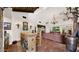 Rustic wet bar with wooden cabinetry and tile flooring at 35035 N Whileaway Rd, Carefree, AZ 85377