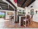 Custom wet bar with wood cabinets and tile floors at 35035 N Whileaway Rd, Carefree, AZ 85377
