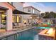 Enjoy evenings by the fire pit and pool; modern seating area included at 3750 E Earll Dr, Phoenix, AZ 85018