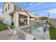 Entertain in style with this large backyard pool, patio, and vibrant mural at 3750 E Earll Dr, Phoenix, AZ 85018