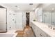 Elegant bathroom with double vanity and walk-in shower at 3750 E Earll Dr, Phoenix, AZ 85018