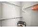 White closet with shelves, hanging space, and a luggage rack at 3750 E Earll Dr, Phoenix, AZ 85018