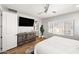 Spacious main bedroom with a large bed and plenty of natural light at 3750 E Earll Dr, Phoenix, AZ 85018