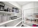 Well-organized pantry with ample shelving for storage at 3750 E Earll Dr, Phoenix, AZ 85018