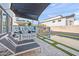 Stunning pool area with artistic wall and patio furniture at 3750 E Earll Dr, Phoenix, AZ 85018