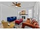 Living room with fireplace, seating area, and decorative accents at 4360 E Mineral Rd, Phoenix, AZ 85044