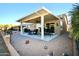 Covered patio with seating area and desert landscaping at 6740 S Coral Gable Dr, Chandler, AZ 85249