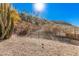 Landscaped backyard with a view and a metal fence at 7887 N 16Th St # 224, Phoenix, AZ 85020
