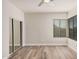 Spacious bedroom with large windows and mirrored closet at 7887 N 16Th St # 224, Phoenix, AZ 85020