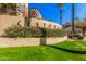 Community entrance with landscaping and building signage at 7887 N 16Th St # 224, Phoenix, AZ 85020