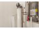 Water heater and water softener in garage area at 7887 N 16Th St # 224, Phoenix, AZ 85020