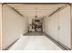 Attached garage with storage shelving and extra space at 7887 N 16Th St # 224, Phoenix, AZ 85020
