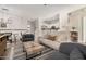 Beige couch and gray armchairs in living room at 7887 N 16Th St # 224, Phoenix, AZ 85020