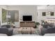 Open living space with a dining area and TV at 7887 N 16Th St # 224, Phoenix, AZ 85020