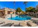 Inviting community pool with lounge chairs and shaded area at 7887 N 16Th St # 224, Phoenix, AZ 85020