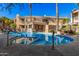 Inviting community pool and spa area with comfortable seating and landscaping at 7887 N 16Th St # 224, Phoenix, AZ 85020