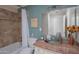 Clean bathroom, featuring a glass sink and tiled shower at 8502 E Catalina Dr, Scottsdale, AZ 85251