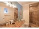 Elegant bathroom with a glass sink and walk-in shower at 8502 E Catalina Dr, Scottsdale, AZ 85251