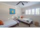 Bedroom with two twin beds and bright decor at 8502 E Catalina Dr, Scottsdale, AZ 85251