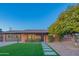 Ranch style home with modern updates and a lush lawn at 8502 E Catalina Dr, Scottsdale, AZ 85251