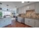 Updated kitchen, featuring granite countertops and stainless steel appliances at 8502 E Catalina Dr, Scottsdale, AZ 85251