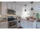 Modern kitchen with stainless steel appliances and granite island at 8502 E Catalina Dr, Scottsdale, AZ 85251