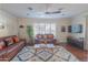 Bright and airy living room with hardwood floors and large window at 8502 E Catalina Dr, Scottsdale, AZ 85251
