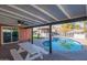 Inviting kidney-shaped pool with patio furniture at 8502 E Catalina Dr, Scottsdale, AZ 85251