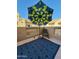 Spacious balcony with umbrella and comfortable seating at 930 N Mesa Dr # 2073, Mesa, AZ 85201