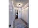 Bright hallway with access to bathroom and laundry at 930 N Mesa Dr # 2073, Mesa, AZ 85201
