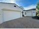 Spacious two-car garage with brick pavers driveway at 965 E Boston St, Gilbert, AZ 85295