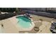 Enjoy outdoor living with a private pool and lounge seating in a meticulously landscaped backyard at 11232 N 152Nd Ln, Surprise, AZ 85379