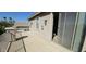 Covered balcony providing a serene outdoor space, perfect for relaxation and entertainment at 11232 N 152Nd Ln, Surprise, AZ 85379
