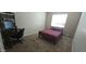 Bedroom with a desk, carpet flooring, a simple black bed frame, and a window providing natural light at 11232 N 152Nd Ln, Surprise, AZ 85379