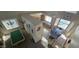 Open-concept living area with a pool table and a spacious dining area with lots of natural light at 11232 N 152Nd Ln, Surprise, AZ 85379