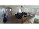 Spacious loft featuring home theater seating, a billiards table, and access to multiple rooms at 11232 N 152Nd Ln, Surprise, AZ 85379