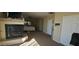 A well-lit main bedroom showcases a fireplace, large windows, and neutral decor for a peaceful retreat at 11232 N 152Nd Ln, Surprise, AZ 85379