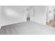 Bright, spacious main bedroom with soft carpet and access to the bathroom and closet at 14670 W Sand Hills Rd, Surprise, AZ 85387