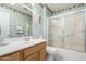 Clean bathroom with shower/tub combo and updated vanity at 14818 N 103Rd Ave, Sun City, AZ 85351