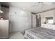 Bedroom with sliding door to closet and dresser at 14818 N 103Rd Ave, Sun City, AZ 85351