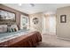 Large bedroom with king-size bed and plenty of natural light at 14818 N 103Rd Ave, Sun City, AZ 85351