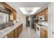 Modern kitchen with stainless steel appliances and ample counter space at 14818 N 103Rd Ave, Sun City, AZ 85351