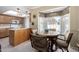 Cozy kitchen nook with a round table perfect for casual dining at 14818 N 103Rd Ave, Sun City, AZ 85351