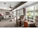 Relaxing living room with ample natural light and comfortable seating at 14818 N 103Rd Ave, Sun City, AZ 85351