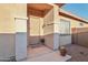 Inviting front entry with a door and potted plants at 1610 W Owens Way, Anthem, AZ 85086